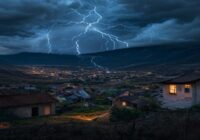 A realistic photo of a lightning storm over a Peruvian landscape with mountains and a small town, dark clouds, lightning bolts striking the ground, and a house with electronic devices visible through