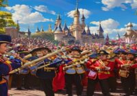 A photorealistic image of a Spanish brass band in colorful traditional uniforms playing in front of Sleeping Beauty Castle at Disneyland Paris, with a crowd of happy tourists watching, sunny day, vibr